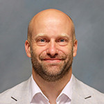 Adam Fisher, DHA, MBA, FACMPE